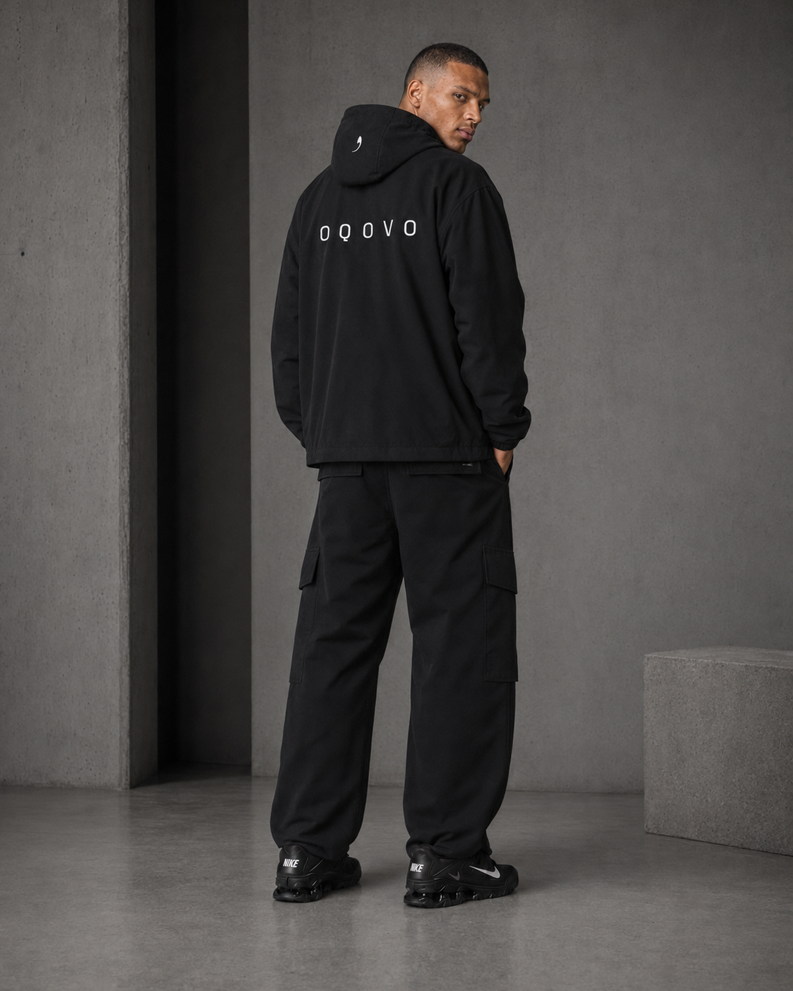 OQOVO Performance Lifestyle Jacket — back with OQOVO wordmark and waw at the hood